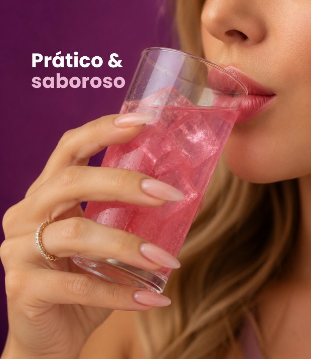 Mulher bebendo o drink rosa refrescante de Gut Glow, sabor abacaxi com hortelã